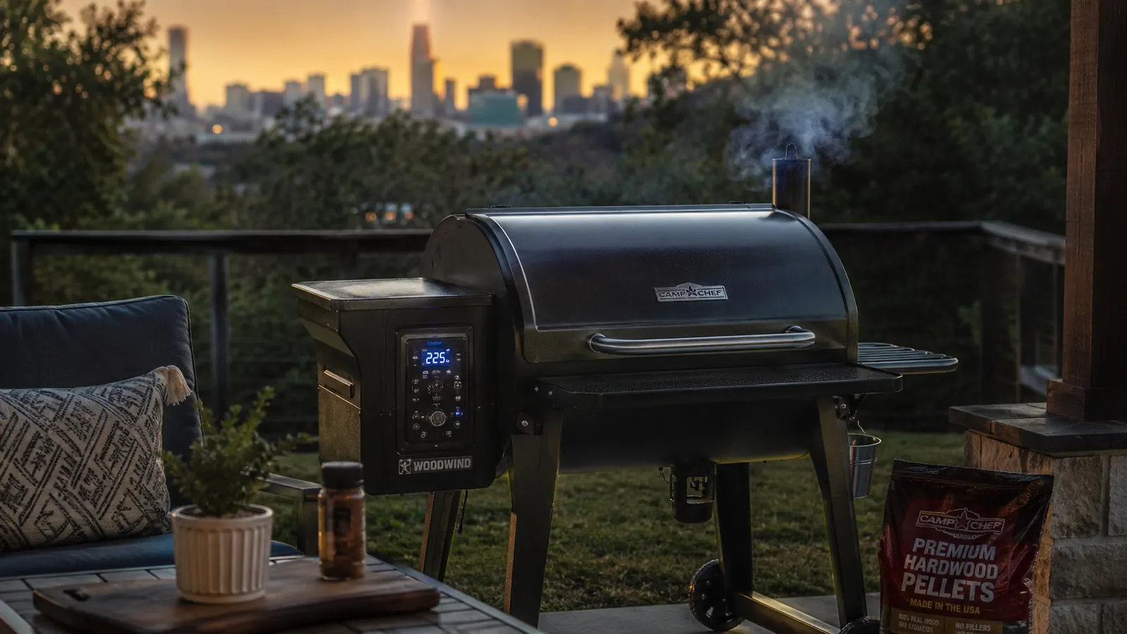 A Pit Boss pellet grill smoker sitting on a backyard patio with smoke rising gently from the stack